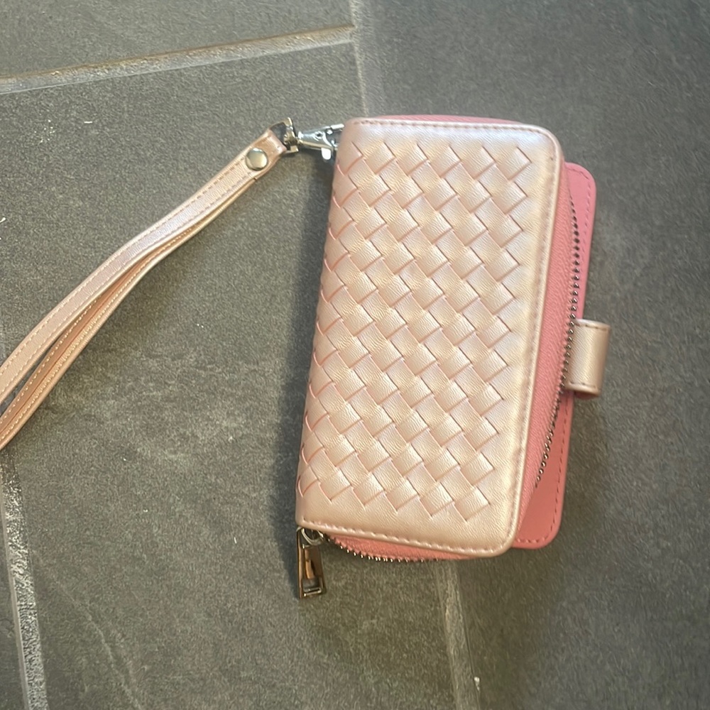 pink wallet with strap, never used